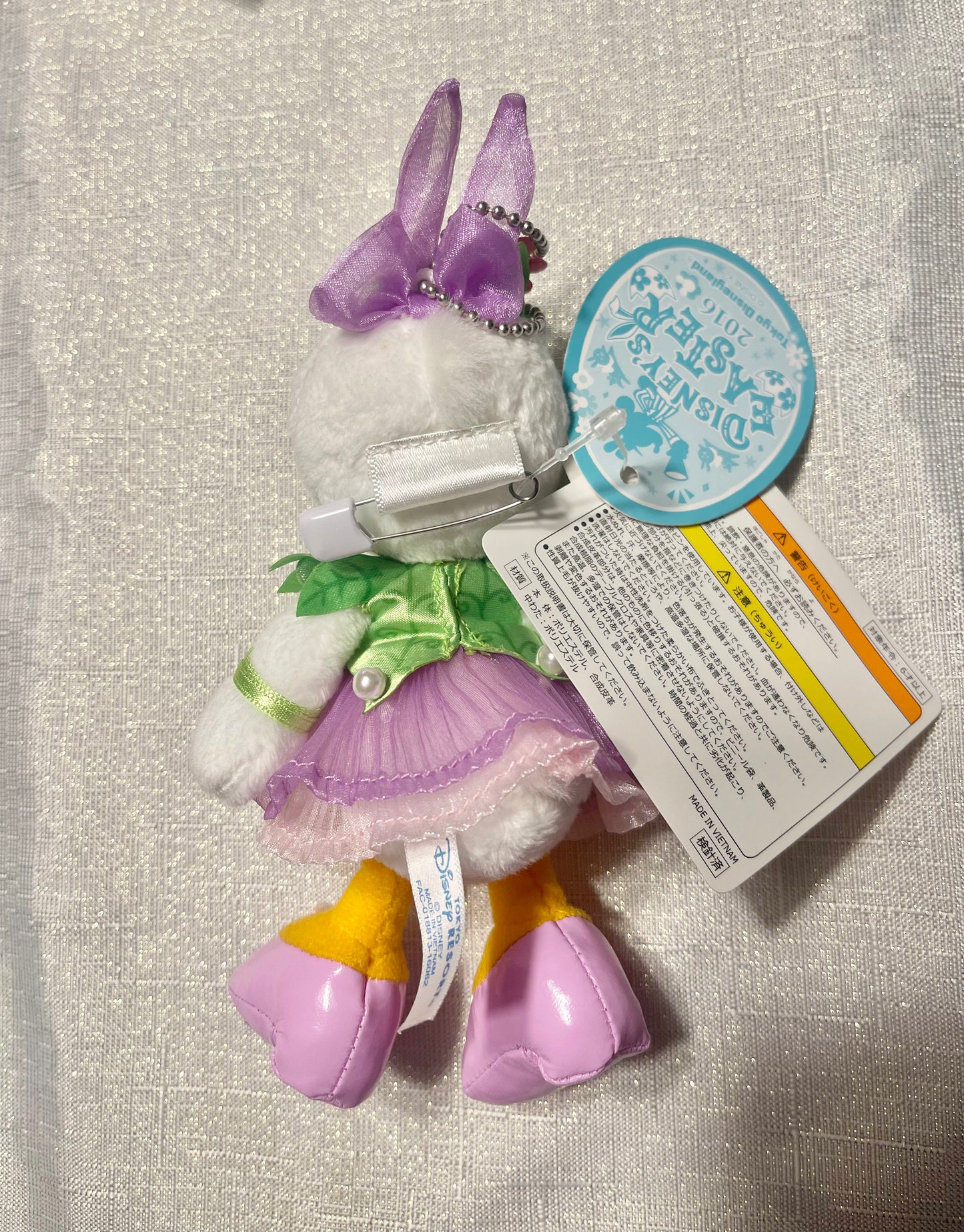 Tokyo Disney Easter Daisy Duck keychain plush badge