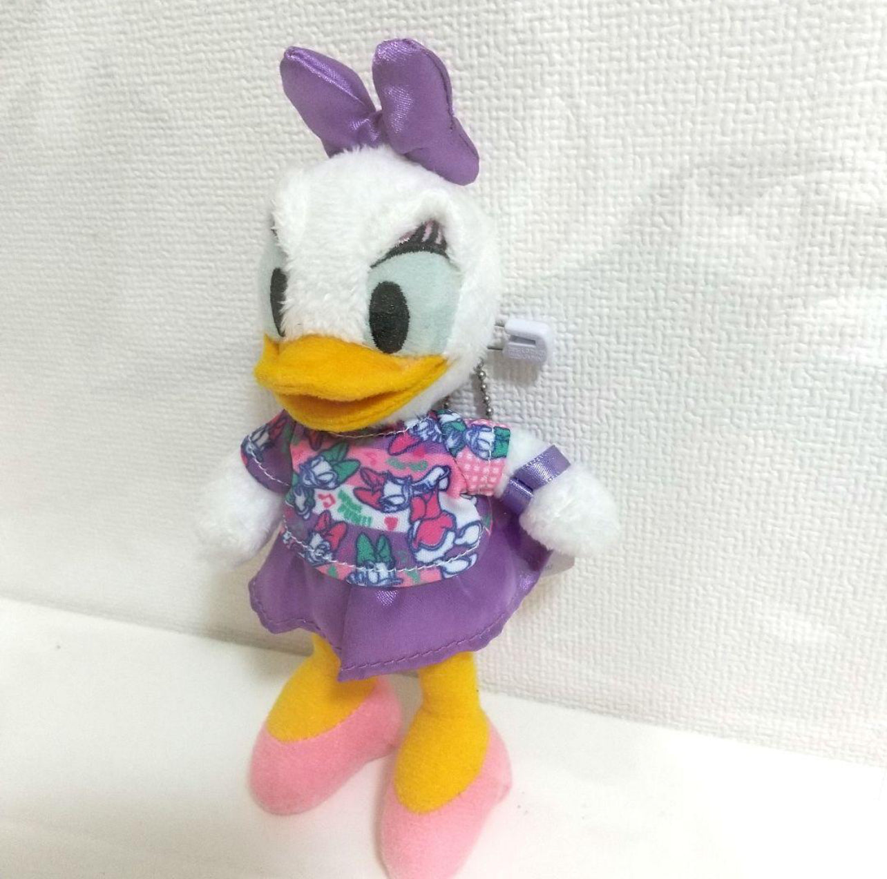 Tokyo Disney park goer Daisy Duck keychain plush badge